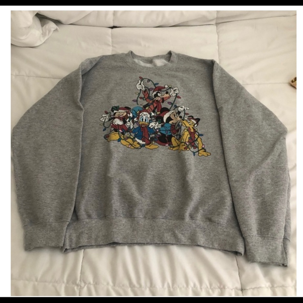 LOOKING FOR urban outfitters Disney Christmas sweater in size medium or large.